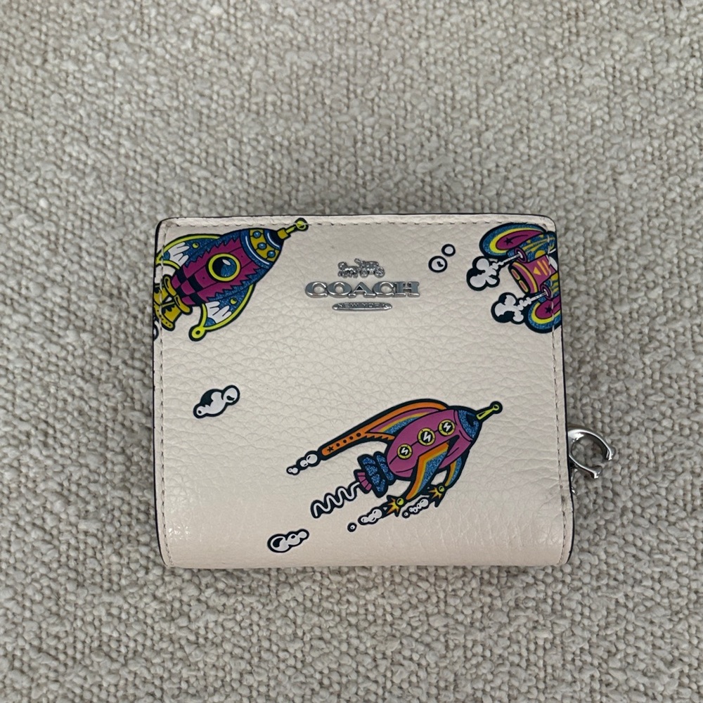 Coach Cream Wallet with Colorful Rocket Design